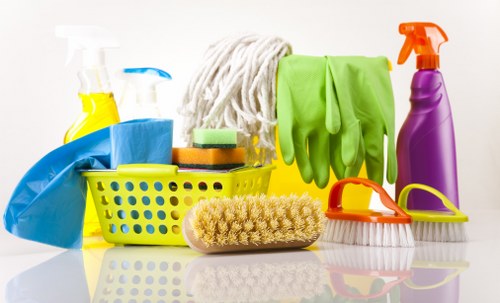 Cleaner using safe practices in a workplace setting