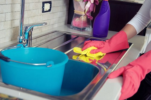 Local Shepherdsbush cleaner working in a modern apartment